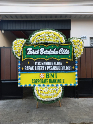 Papan Bunga Duka di Sujung
