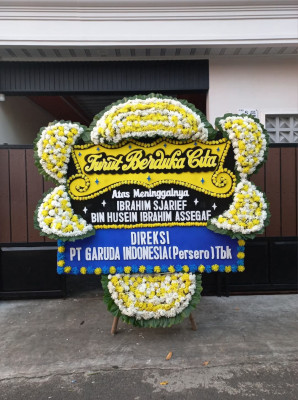 Papan Bunga Duka di Sujung