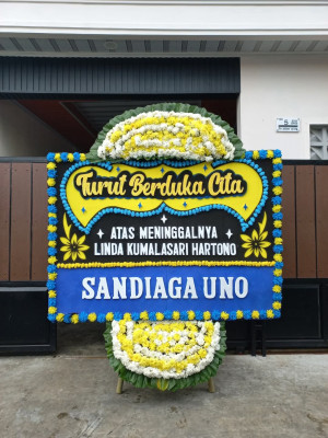 Papan Bunga Duka di Sujung